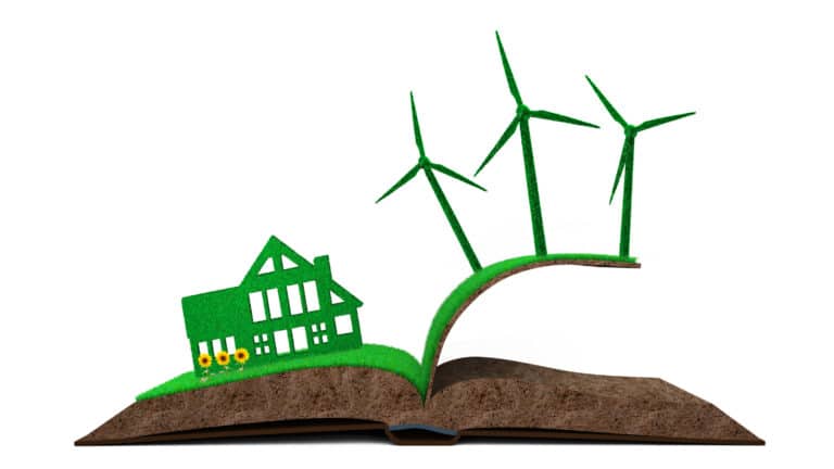 Turbines de maison verte sur livre texturé de sol d'herbe, illustration 3D.